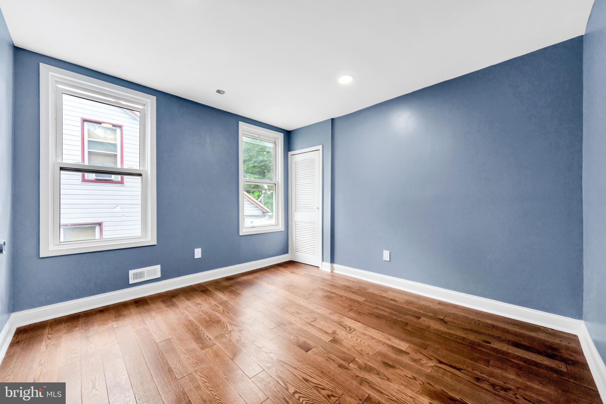 14 West Providence Road Lansdowne, PA 19050 - Photo 8 of 22 wooden floor in an empty room with a window