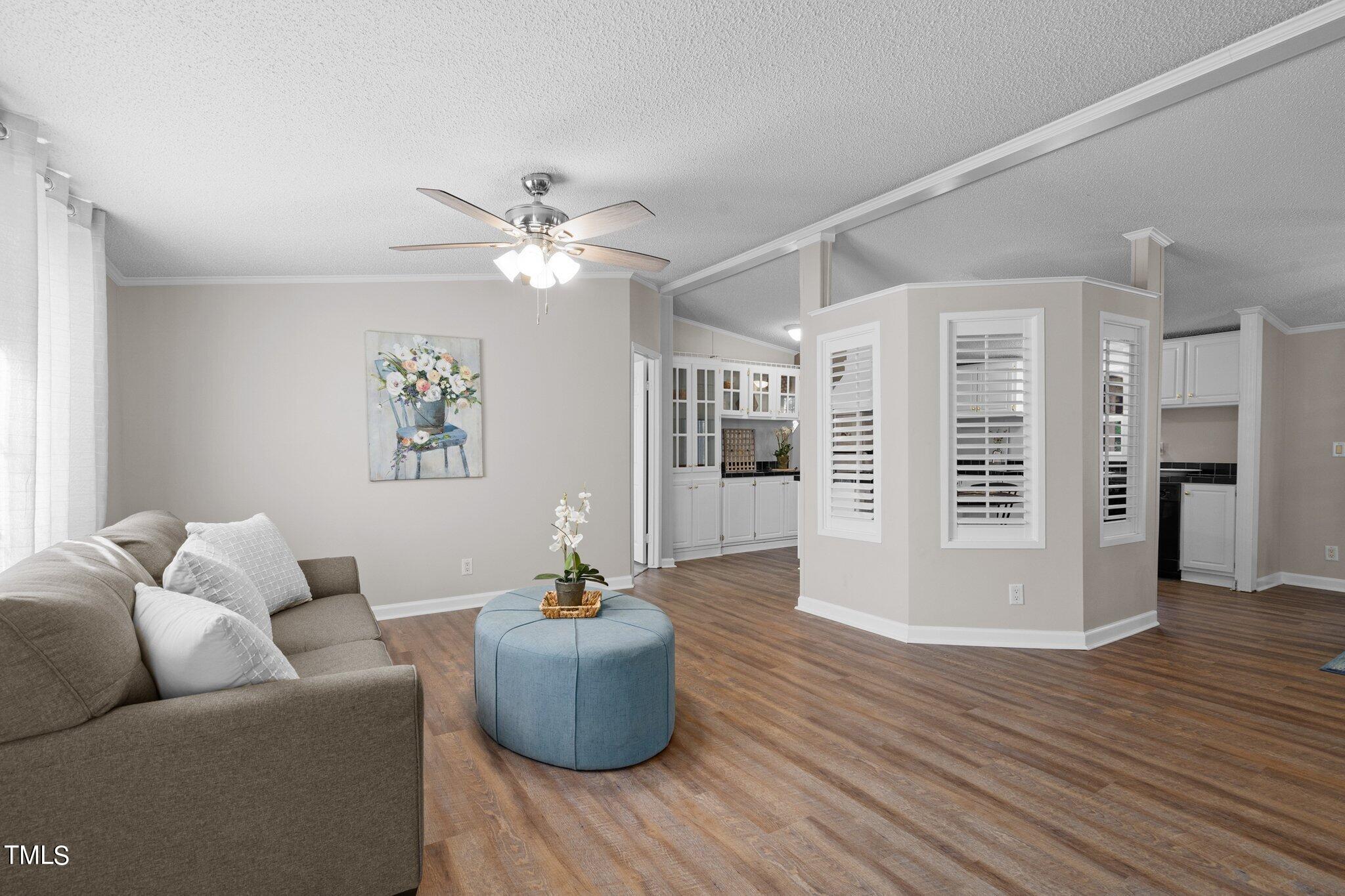 3420 Craven Road Middlesex, NC 27557 - Photo 3 of 31 a living room with furniture and wooden floor