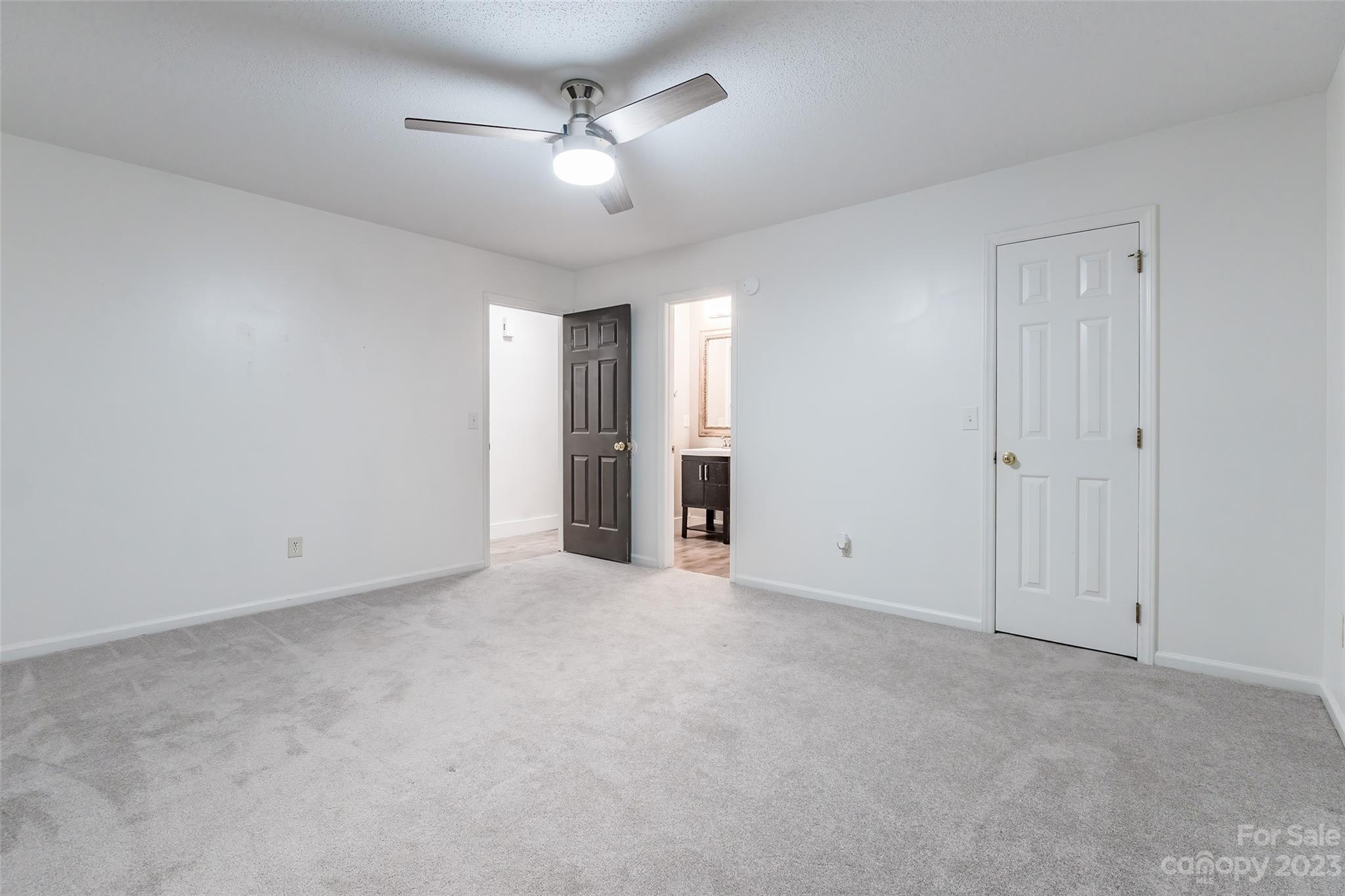 2117 Bon Villa Way Tega Cay, SC 29708 - Photo 12 of 25 a view of an empty room with a ceiling fan