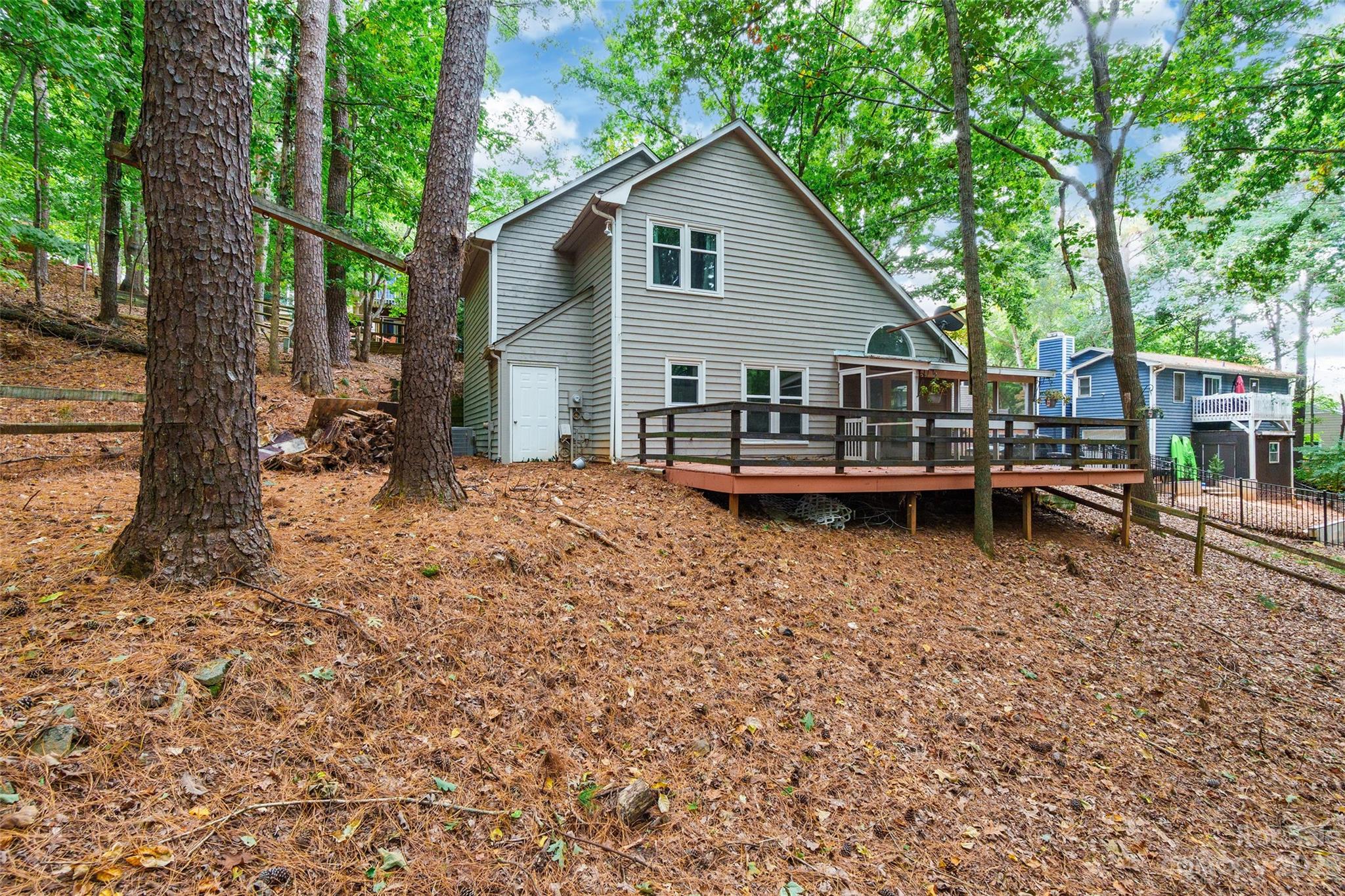 2117 Bon Villa Way Tega Cay, SC 29708 - Photo 25 of 25 a view of a house with backyard and sitting area