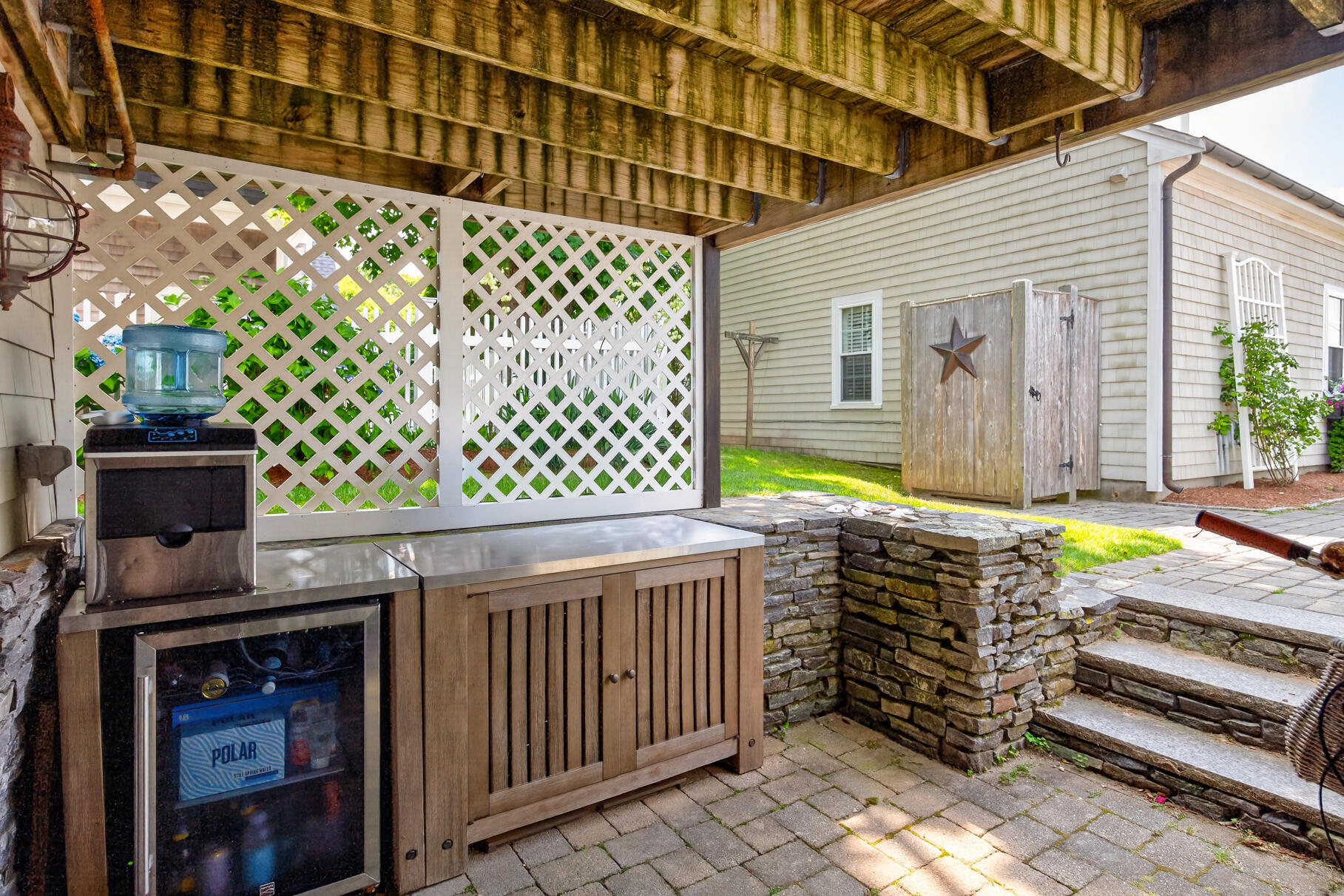 33 Harbor View Road Harwich Port, MA 02646 - Photo 37 of 50 a front view of a house with a garden