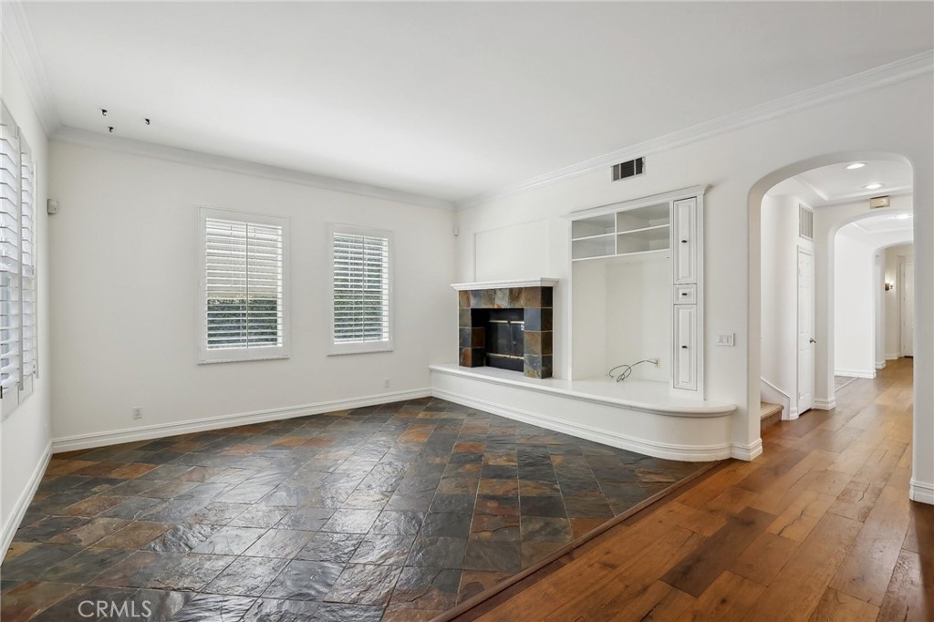 18 Winfield Drive Ladera Ranch, CA 92694 - Photo 16 of 39 a view of an empty room with wooden floor and a window