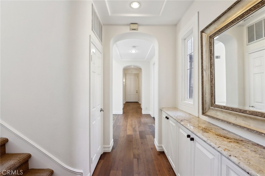 18 Winfield Drive Ladera Ranch, CA 92694 - Photo 17 of 39 a view of a hallway with wooden floor and closet