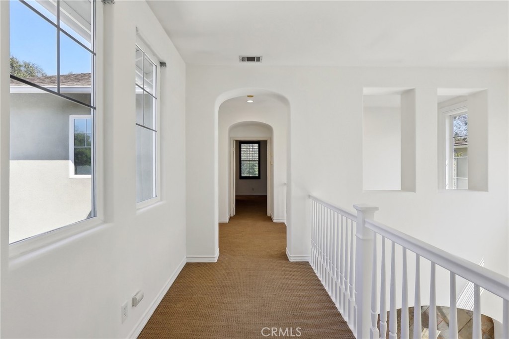 18 Winfield Drive Ladera Ranch, CA 92694 - Photo 18 of 39 a view of a hallway view with staircase