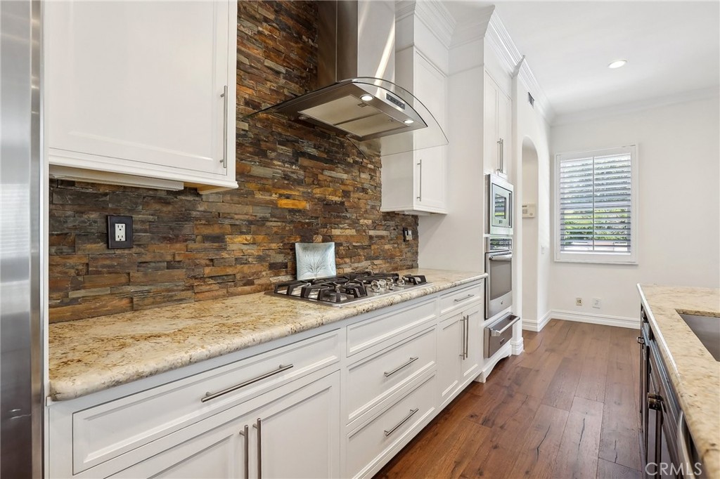 18 Winfield Drive Ladera Ranch, CA 92694 - Photo 2 of 39 a kitchen with sink stove and cabinets