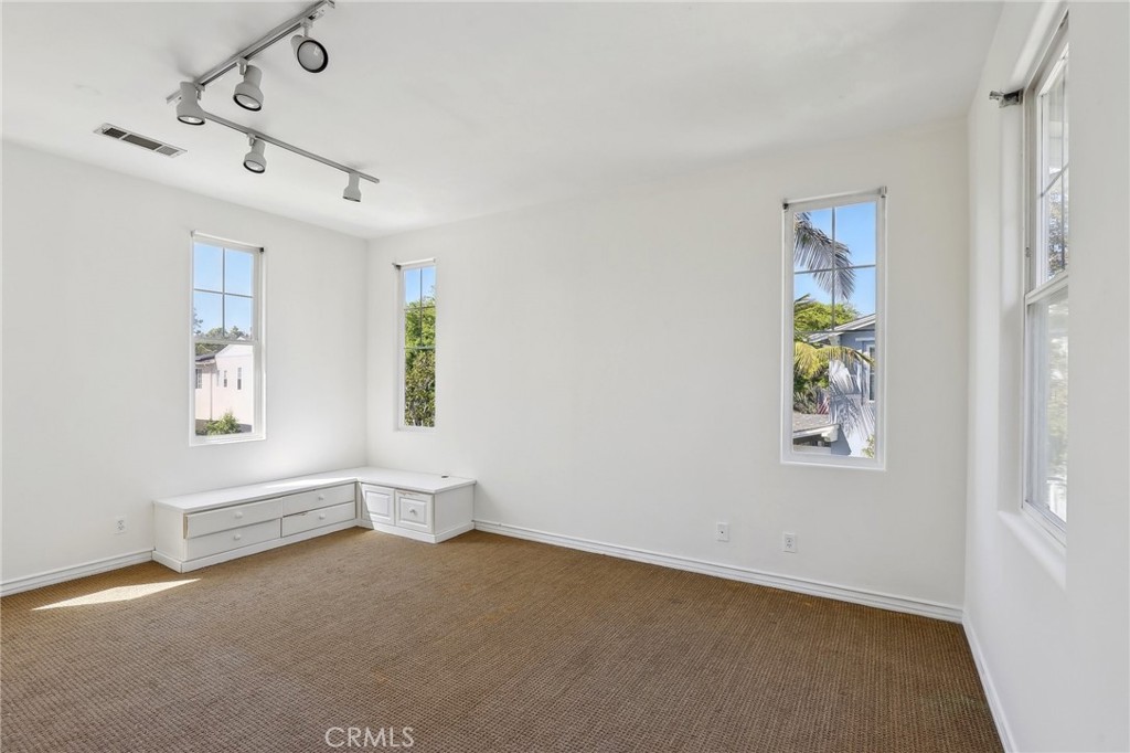 18 Winfield Drive Ladera Ranch, CA 92694 - Photo 25 of 39 a view of room with window and ceiling fan