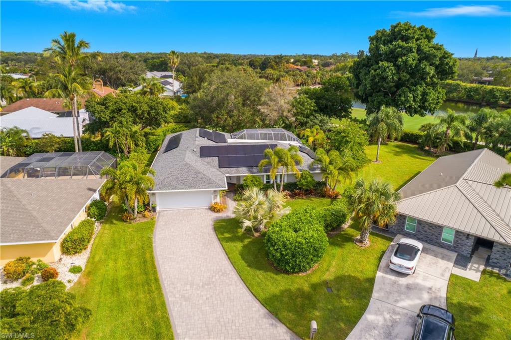 330 Country Club Drive Naples, FL 34110 - Photo 3 of 37 an aerial view of residential houses with outdoor space