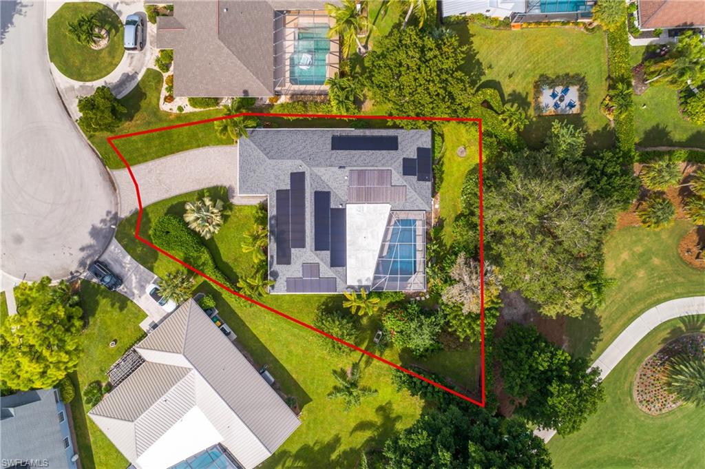 330 Country Club Drive Naples, FL 34110 - Photo 35 of 37 an aerial view of a house with swimming pool