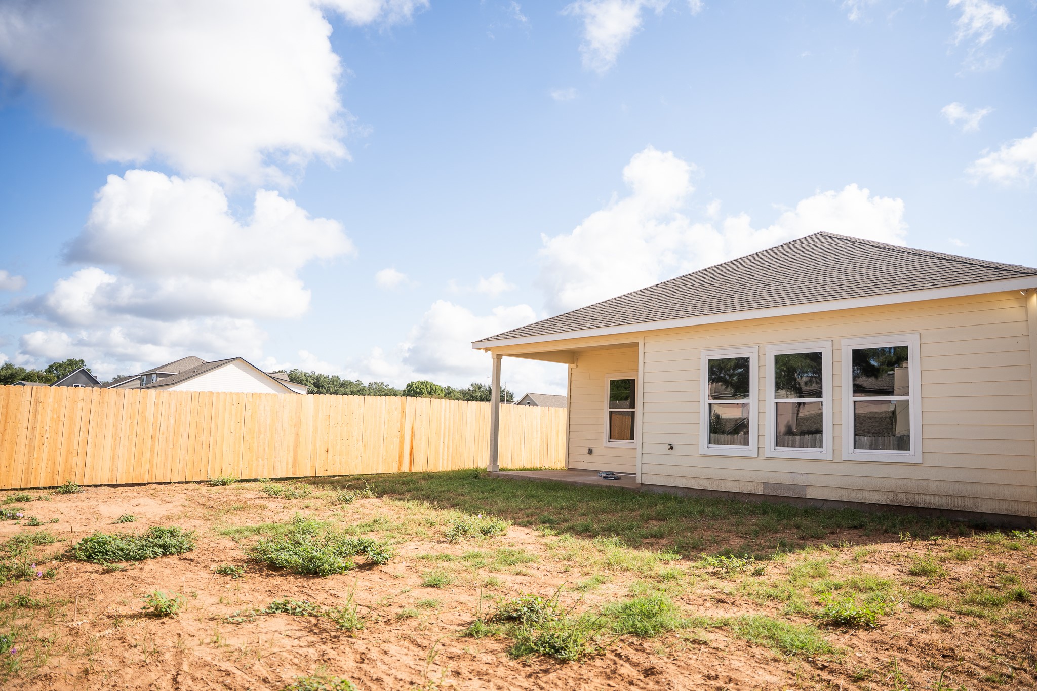 309 String Prairie Way Smithville, TX 78957 - Photo 30 of 30 a view of a house with a yard