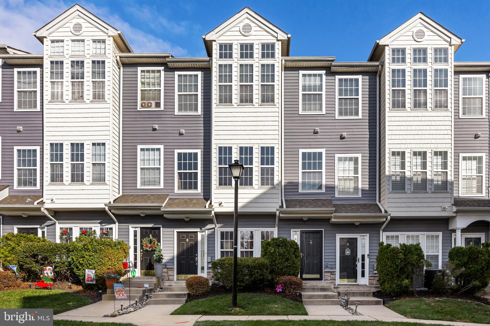a front view of a building with garden