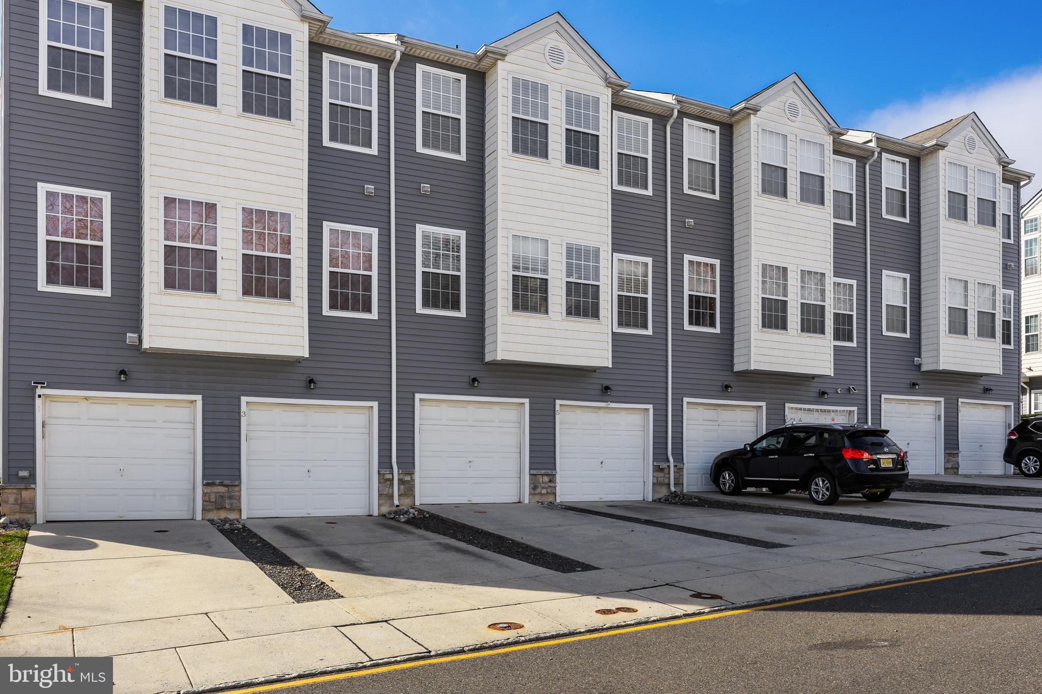 5 River Lane Delanco, NJ 08075 - Photo 23 of 26 a car parked in front of a building