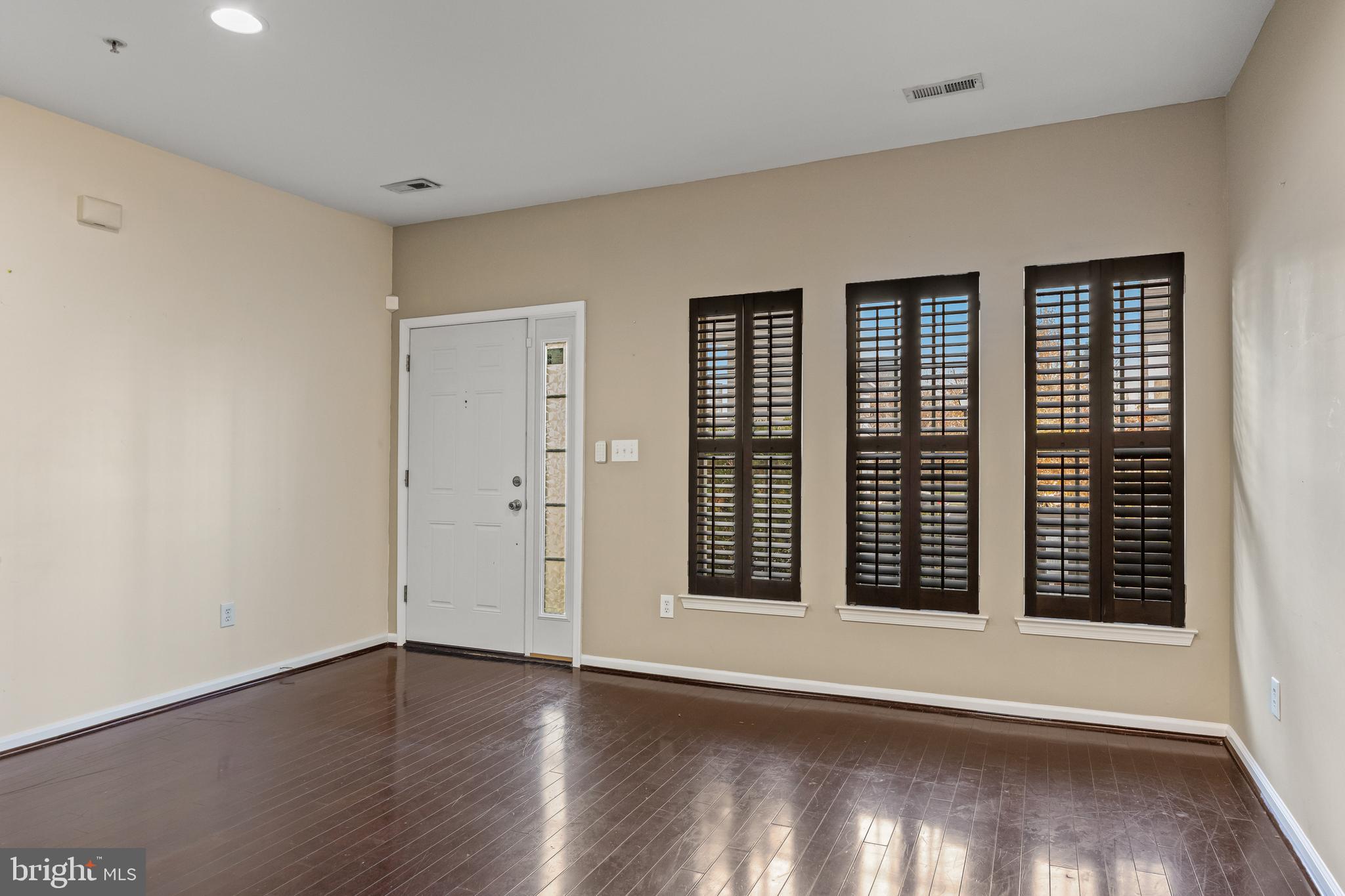 5 River Lane Delanco, NJ 08075 - Photo 5 of 26 wooden floor in an empty room with a window
