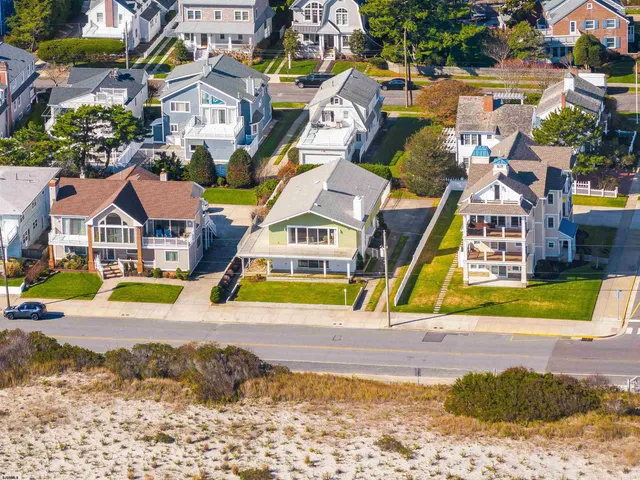 wooden floor with a water view