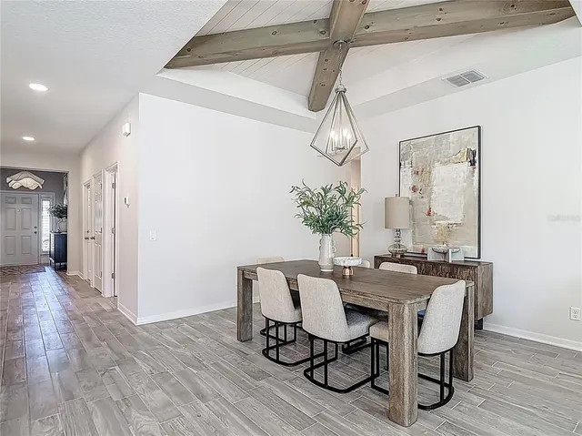 a bedroom with a bed and cabinets