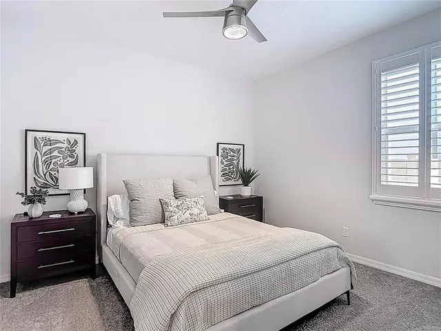 a bathroom with a toilet a sink and a mirror