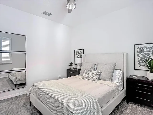 an aerial view of house with yard swimming pool and outdoor seating