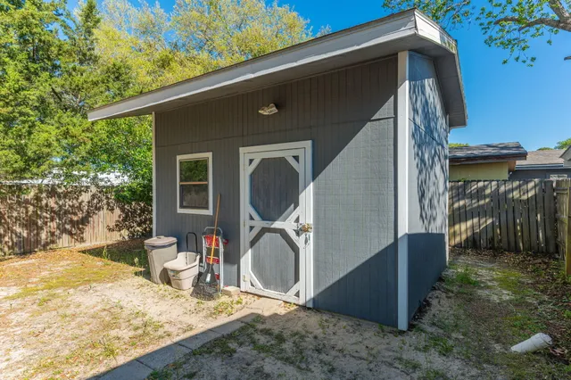 a view of house with yard