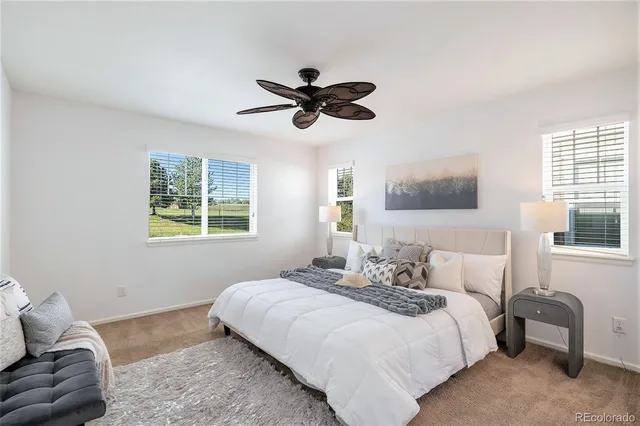 a bedroom with a bed and furniture