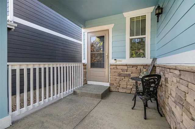 a view of a porch with a bench