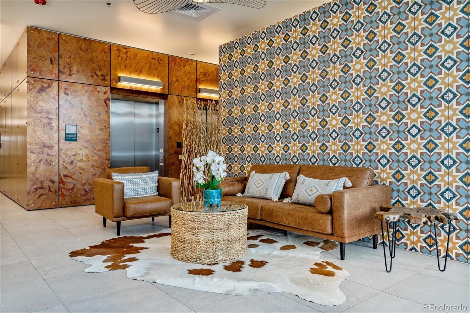 603 Inca Street, Unit 309 Denver, CO 80204 - Photo 4 of 27 a building outdoor space with patio furniture