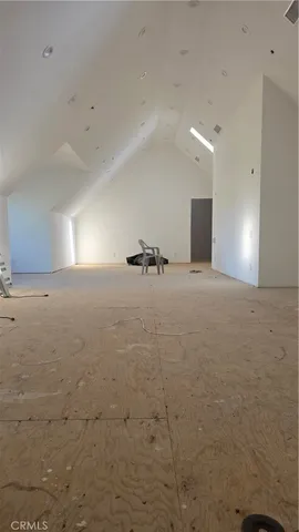 a view of a room with natural light