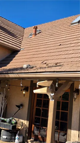 a front view of a house with parking space