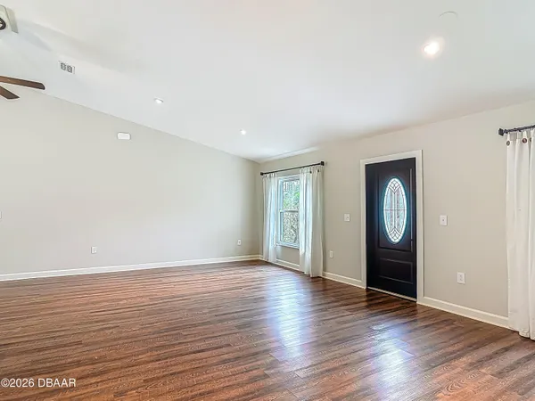 a large room with wooden floor