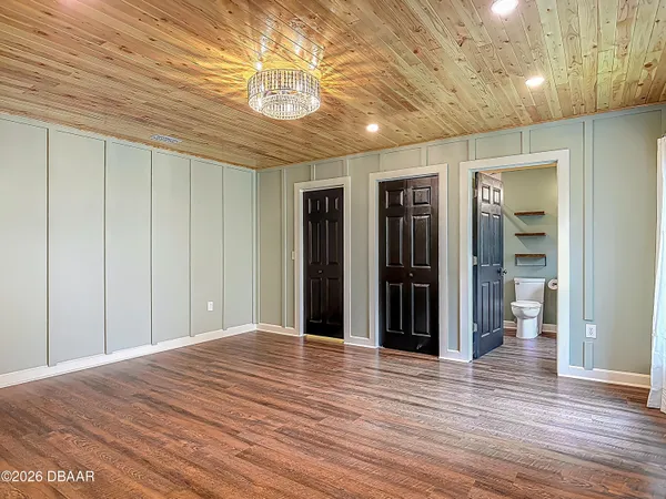 a garden view with a playing court