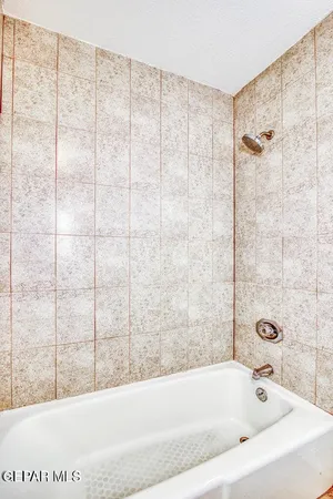 a front view of a house with garage