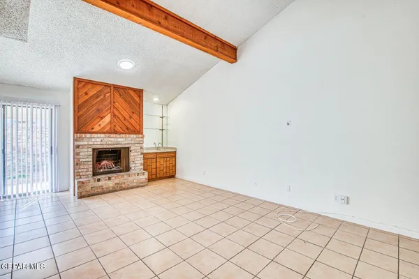 a view of a room with white walls