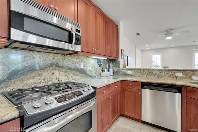 a kitchen with a stove and a microwave