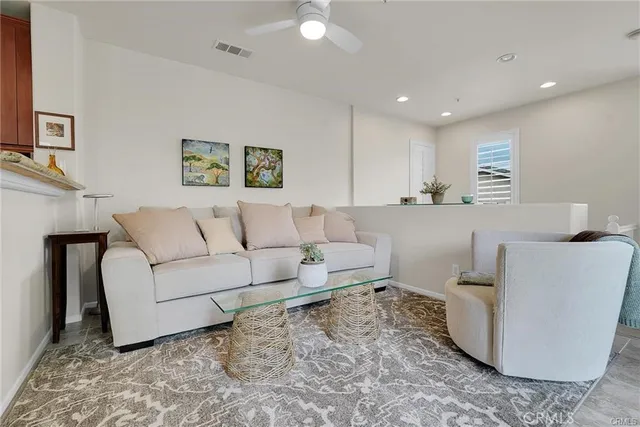 a living room with furniture and a couch