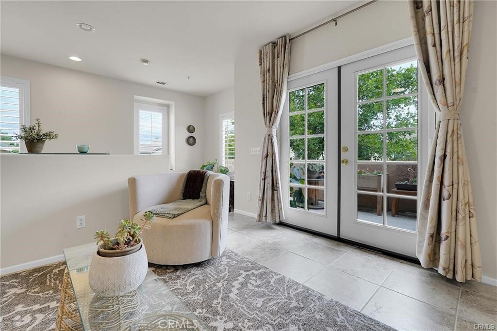 33631 Winston Way Temecula, CA 92592 - Photo 10 of 29 a living room with furniture and a large window