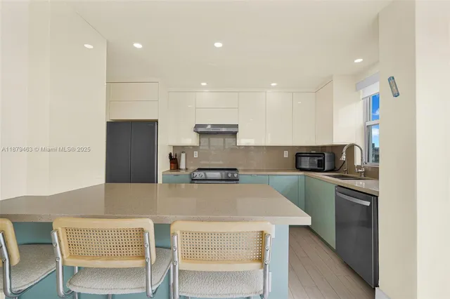 $935,000 | 9100 West Bay Harbor Drive, Unit 8A, Bay Harbor Islands, FL 33154