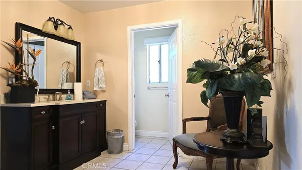 a bathroom with a toilet and a sink