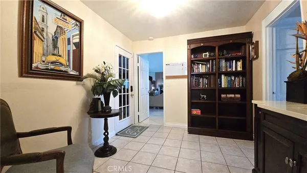 a view of a bathroom with a sink and a mirror
