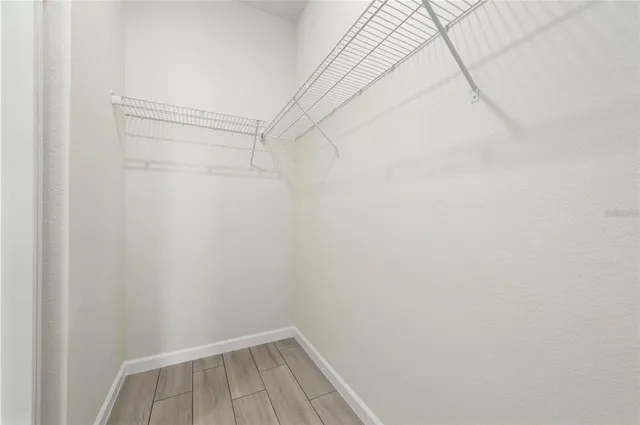 a view of a room with racks on the wall