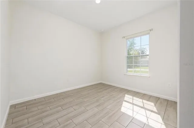 an empty room with windows