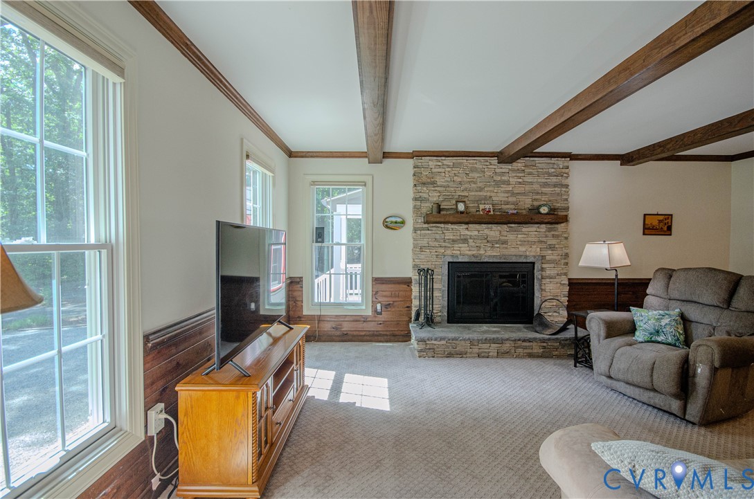 12500 Musical Lane Midlothian, VA 23113 - Photo 8 of 51 Living area featuring a stone-clad fireplace with