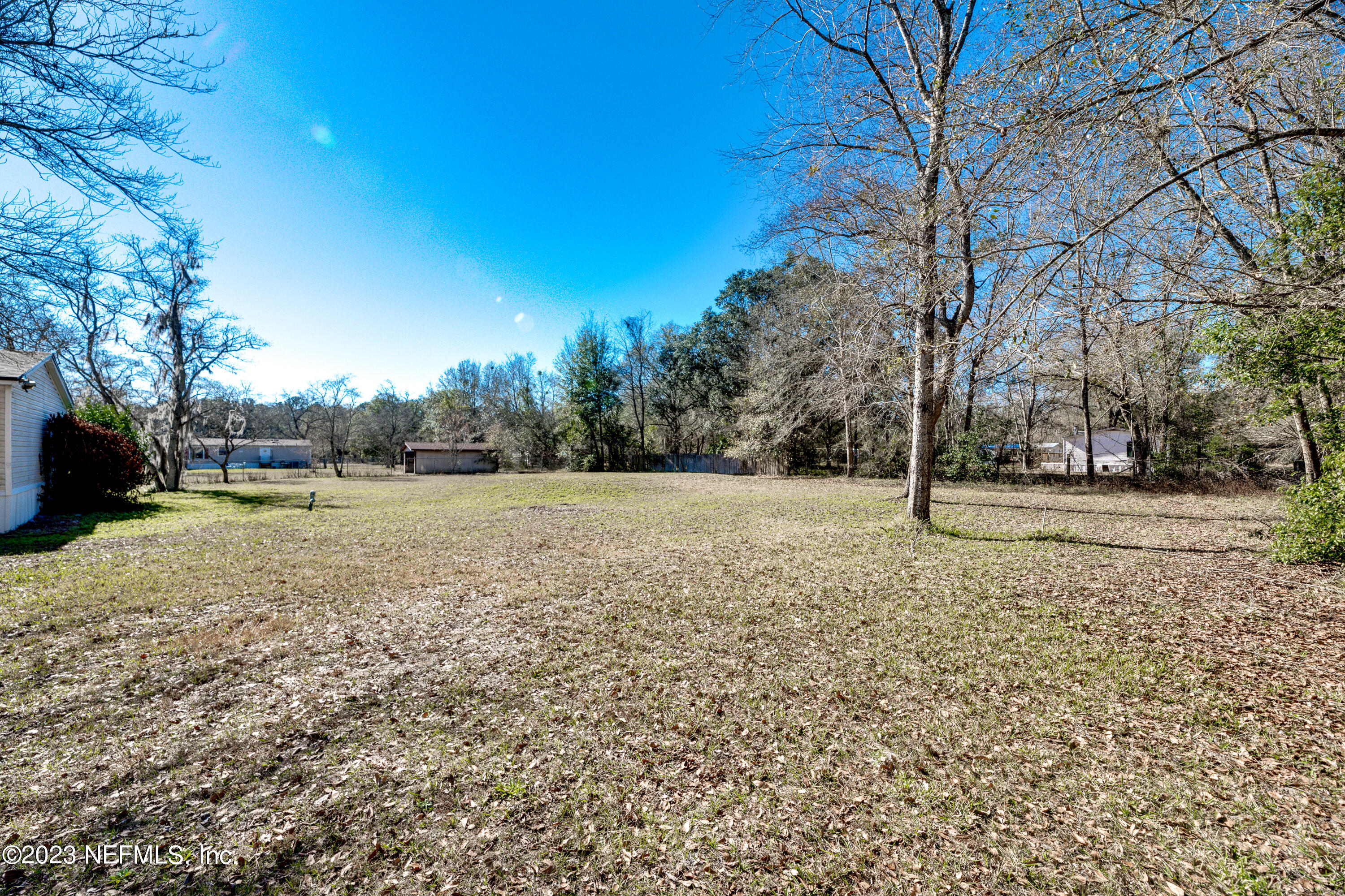 4014 Pinto Road Middleburg, FL 32068 - Photo 6 of 19 a view of outdoor space with deck and yard