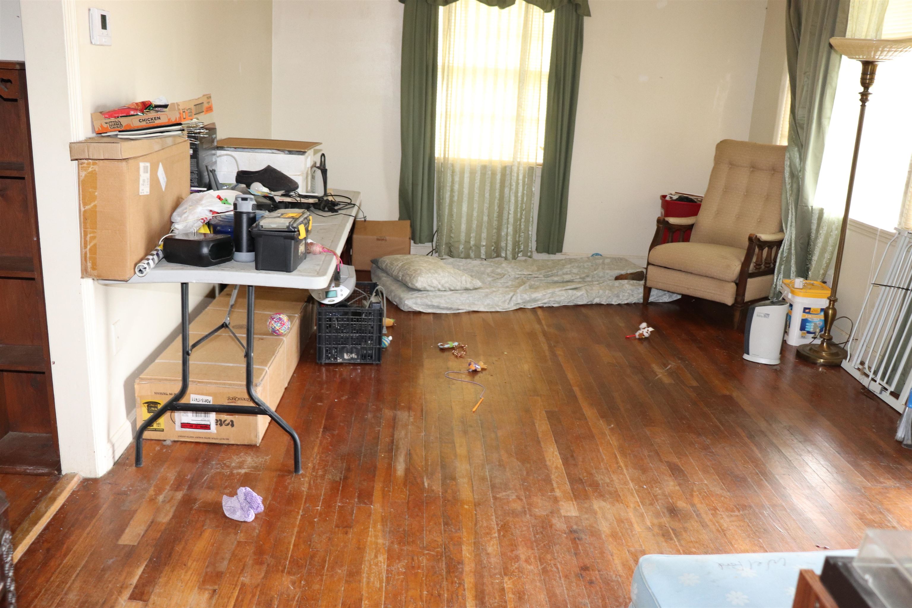 7907 Martha Road Millington, TN 38053 - Photo 3 of 6 a living room with furniture and a wooden floor