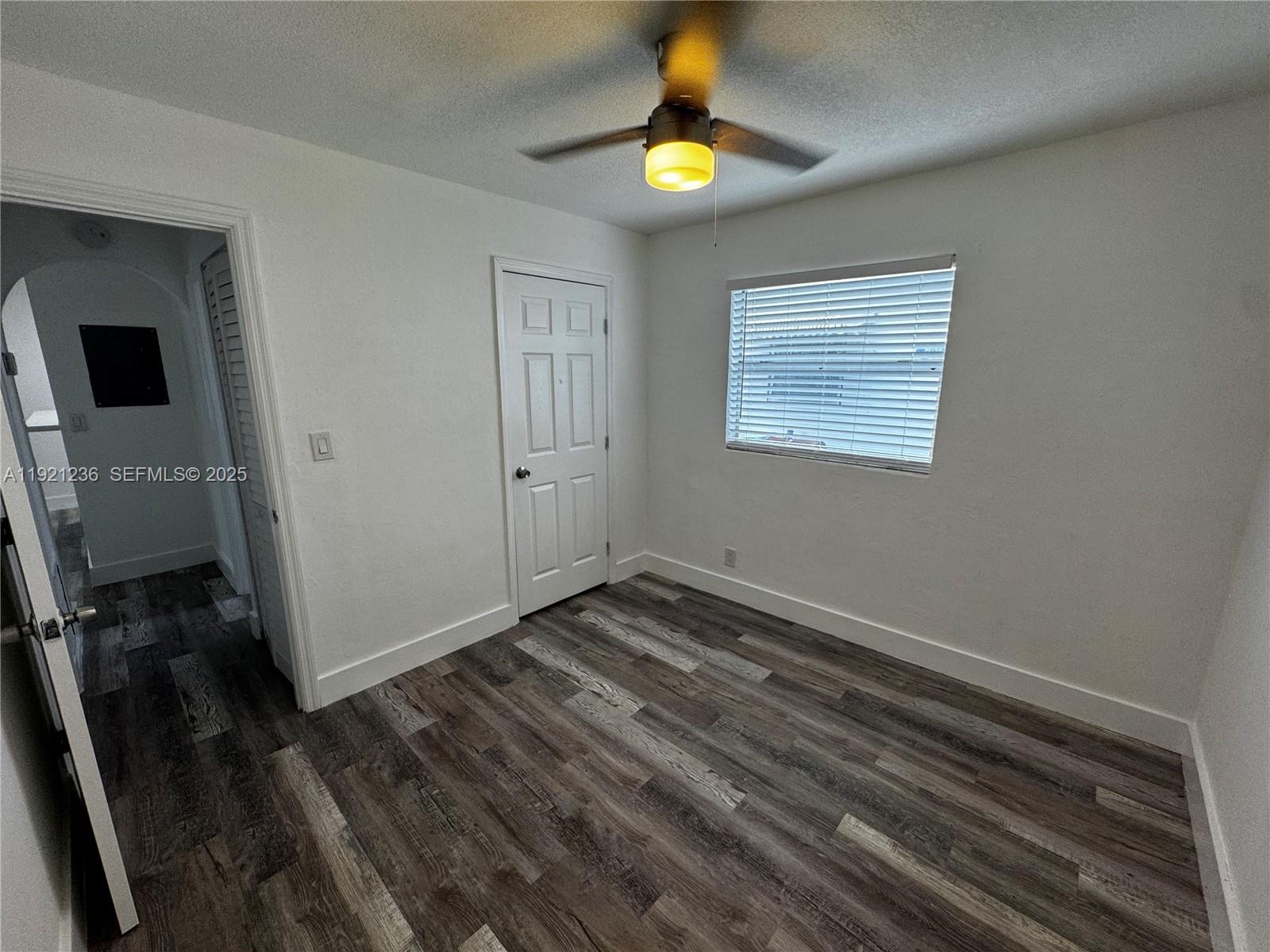 2034 Taylor Street Hollywood, FL 33020 - Photo 14 of 35 a view of an empty room with a window