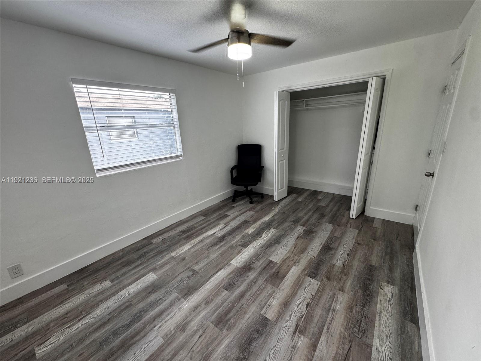 2034 Taylor Street Hollywood, FL 33020 - Photo 15 of 35 a bedroom with a bed and a window