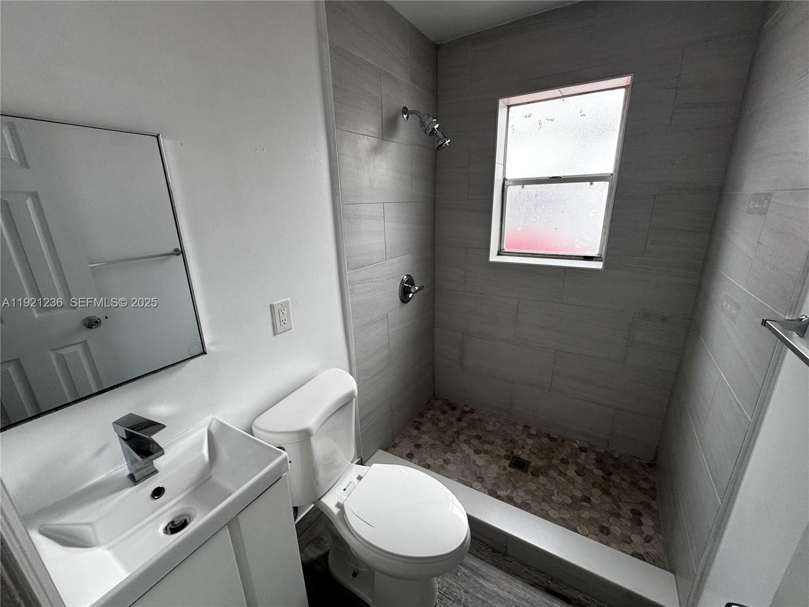2034 Taylor Street Hollywood, FL 33020 - Photo 20 of 35 a bathroom with a sink toilet and shower