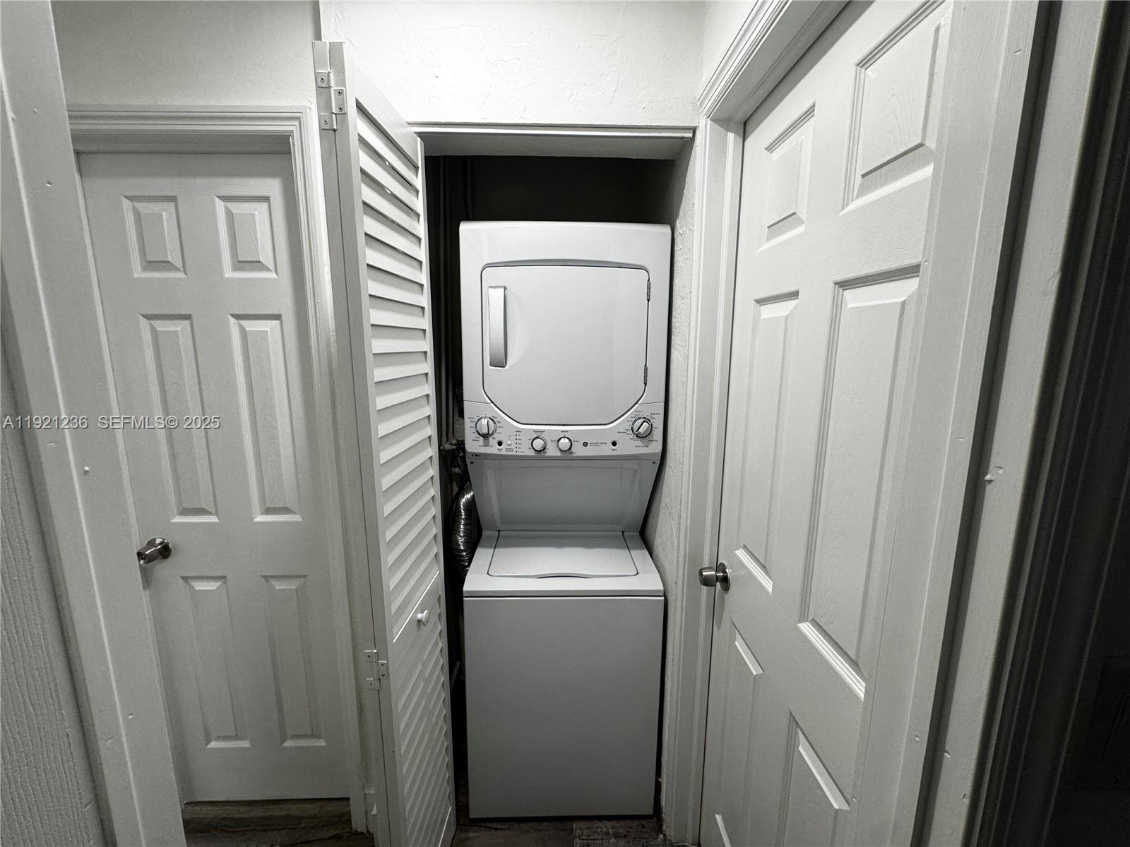 2034 Taylor Street Hollywood, FL 33020 - Photo 25 of 35 a view of a storage room with a washer and dryer