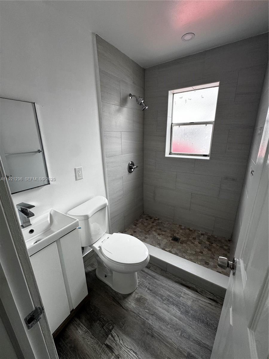2034 Taylor Street Hollywood, FL 33020 - Photo 28 of 35 a bathroom with a sink toilet and shower