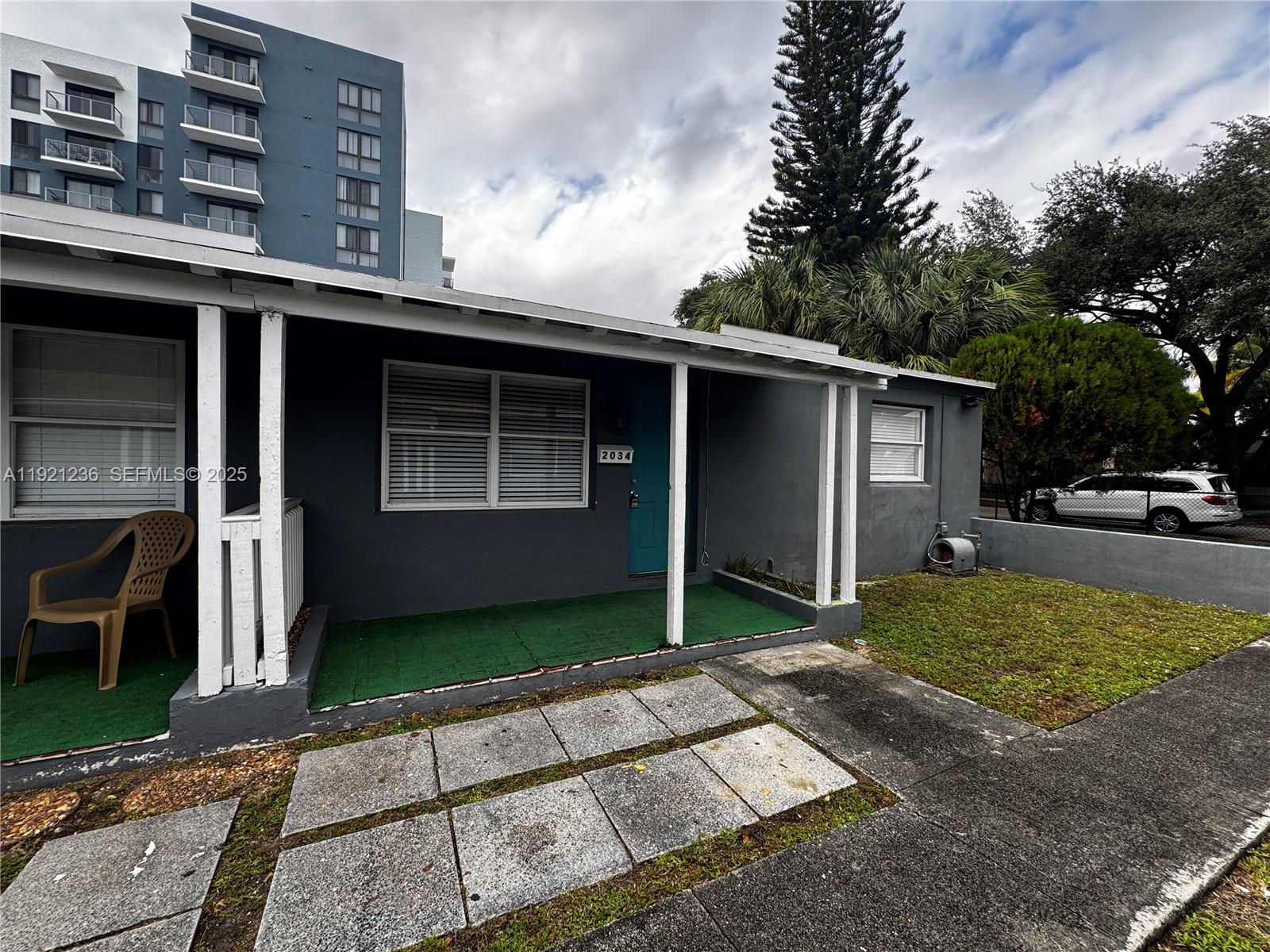 2034 Taylor Street Hollywood, FL 33020 - Photo 3 of 35 a view of backyard of the house