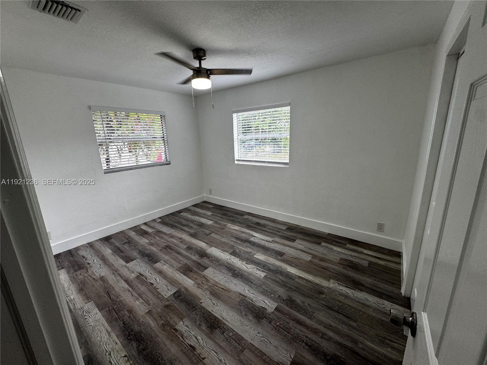 2034 Taylor Street Hollywood, FL 33020 - Photo 32 of 35 a view of an empty room with a window