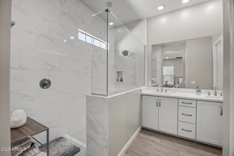 a bedroom with bed and window