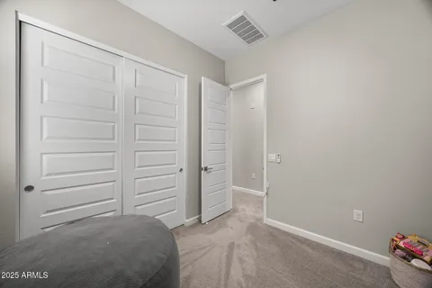 a room that has a bed and a window